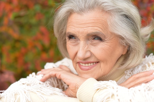 Portrait of a senior beautiful woman posing outdoors