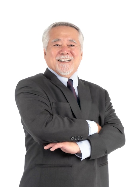 Portrait of a senior business man with suit Asian senior man old man feel happy good health standing arms crossed isolated on white background lifestyle senior male concept