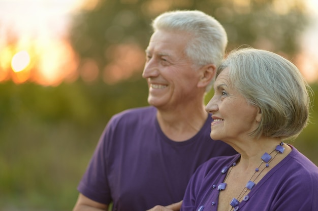 Portrait of a senior couple in autumn park