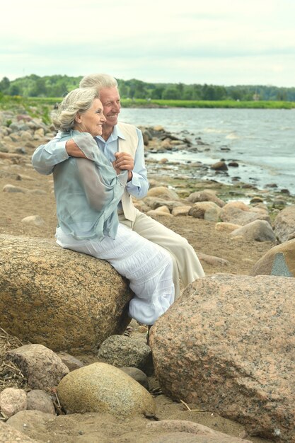 Portrait of a senior couple near the water