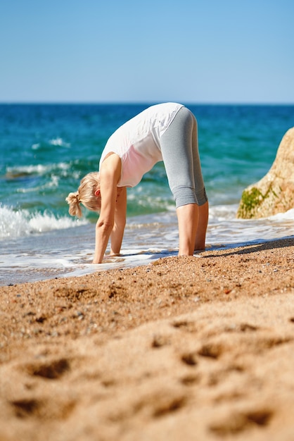 Portrait of senior woman exercise in for sports at sea