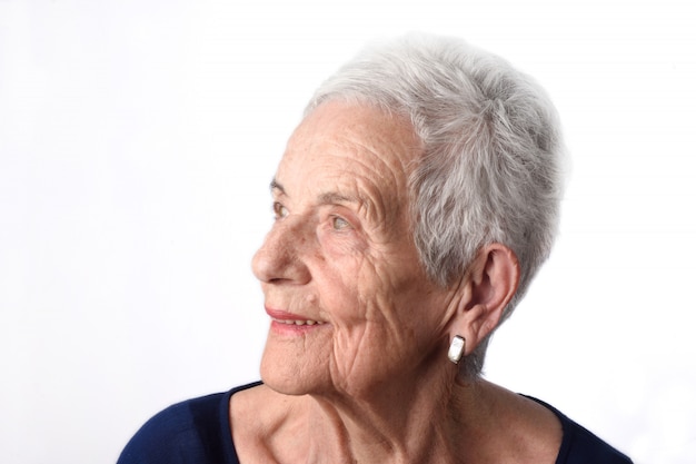 Portrait of a senior woman on white background