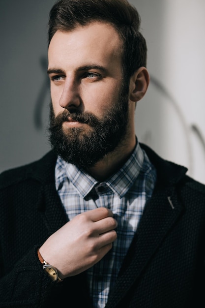 Portrait of a serious bearded man thinking conceptx9