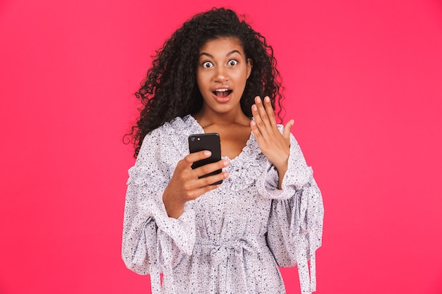 Portrait of a shocked young african woman