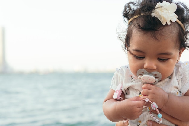 Portrait of small child with pacifier