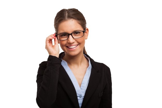 Portrait of a smiling beautiful woman holding her eyeglasses