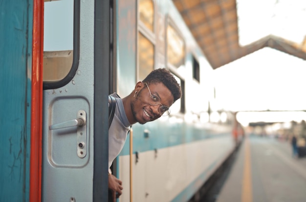 portrait of a smiling black man in a station