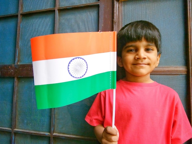 Portrait of smiling boy standing