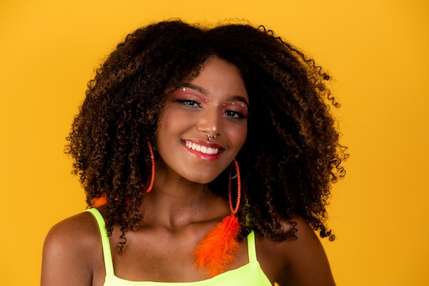 Portrait of smiling Brazilian woman with afro hair