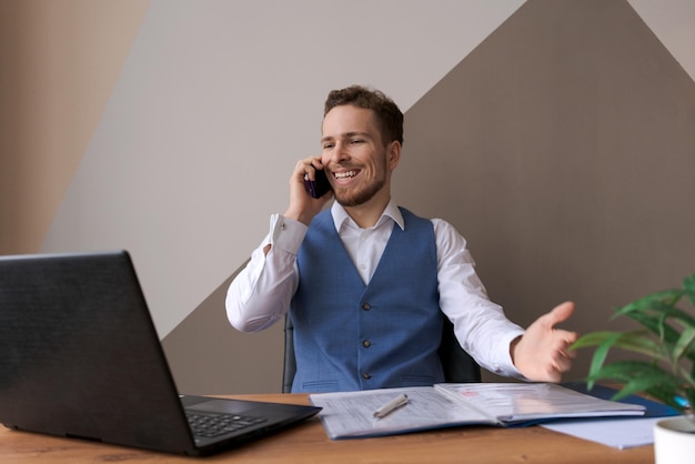 Portrait smiling business man with beard talking on his smartphone while