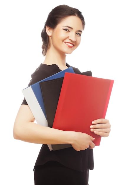 Portrait of smiling business woman with folders