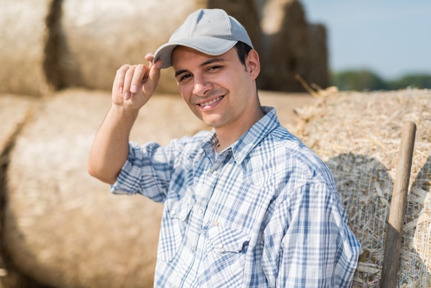 Portrait of a smiling farmer in his field