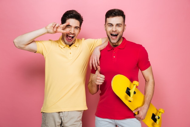 Portrait of a smiling friends showing peace gesture