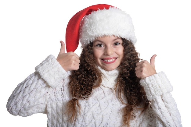 Portrait of smiling little girl with Christmas hat