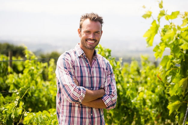 Portrait of smiling man at vineyard