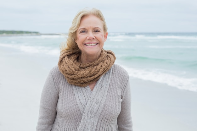 Portrait of a smiling senior woman at beach