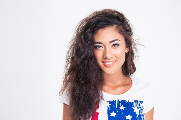 Portrait of a smiling teen girl with curly hair