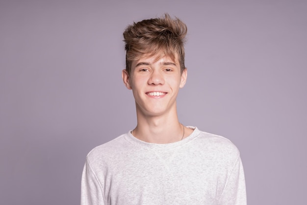 Portrait of smiling teenager guy