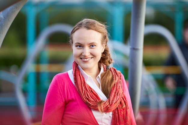 Portrait of smiling white woman on playground