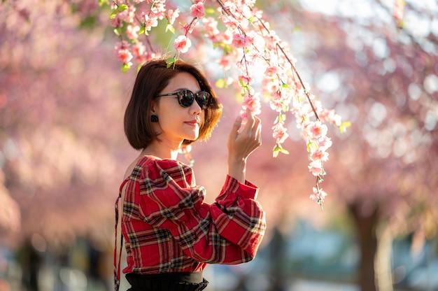 Portrait of a smiling woman asia beautiful model short hair posing