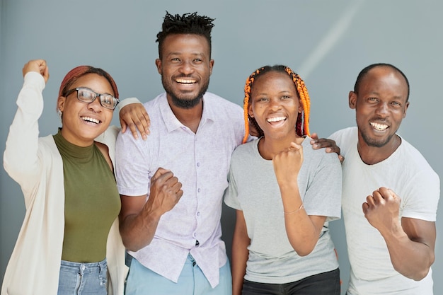 Portrait Of Smiling Young happy Friends