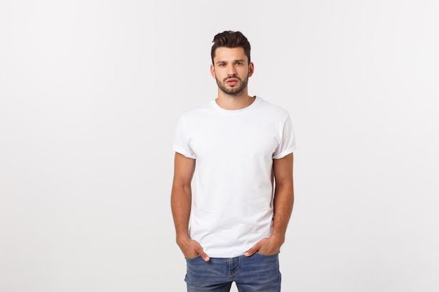 Portrait of smiling young man in a white t-shirt isolated on white .