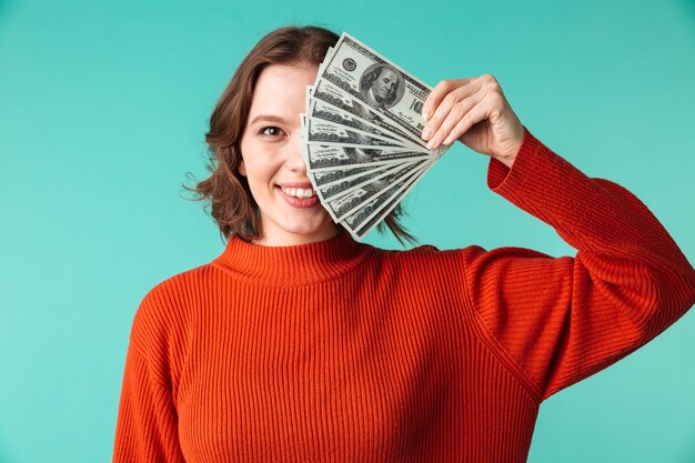 Portrait of a smiling young woman dressed in sweater