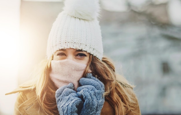 Photo portrait snow and woman with gloves scarf or winter fashion for cold weather and climate in park in norway travel break and girl tourist on holiday vacation freezing in nature and outdoor ice