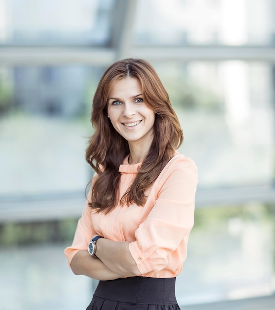 Portrait of successful business woman on the background of the spacious office