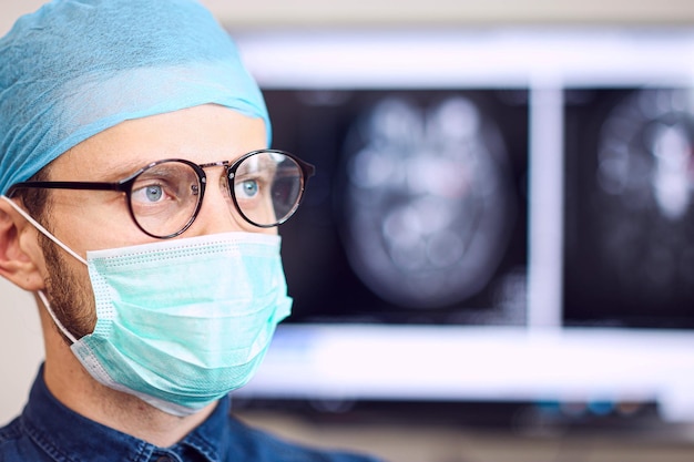 Portrait of a surgeon doctor in uniform at the medical office