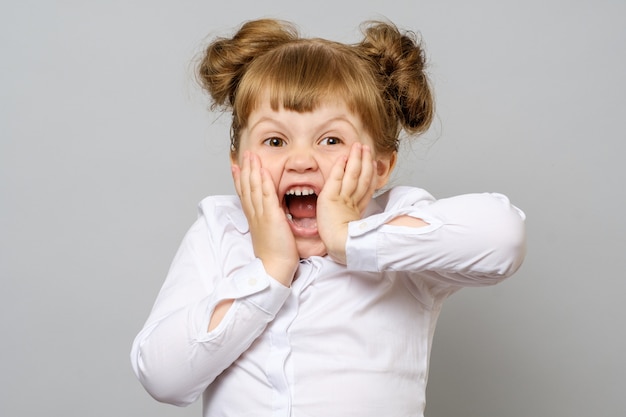 Portrait of surprised little girl