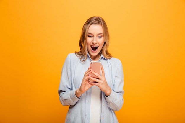 Portrait of a surprised young girl with braces