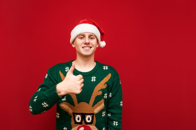 Portrait teenager boy with Christmas sweater