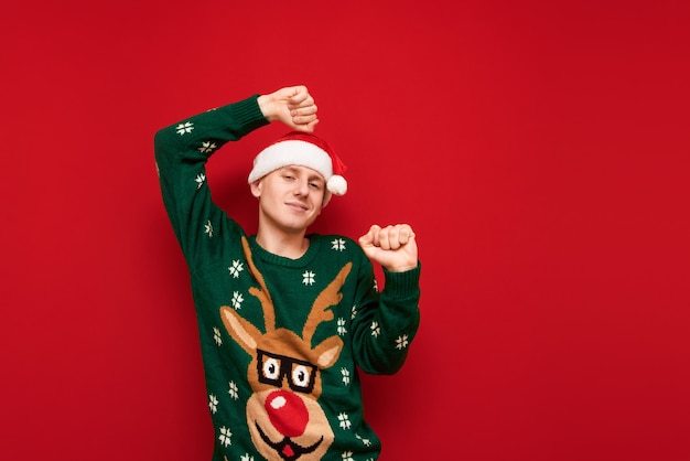 Portrait teenager boy with Christmas sweater