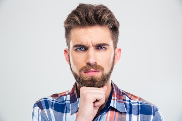 Portrait of a thoughtful man looking at camera