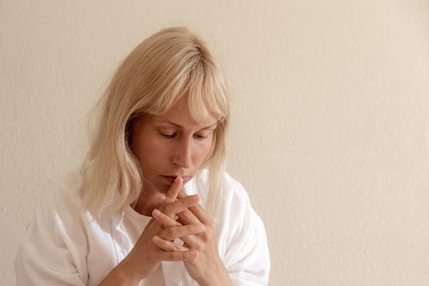 Portrait of a thoughtful sad woman closeup