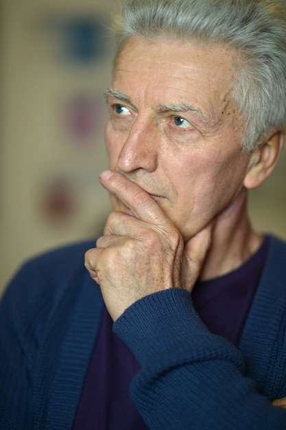 Portrait of a thoughtful senior man close-up