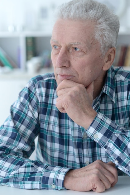 Portrait of thoughtful senior man