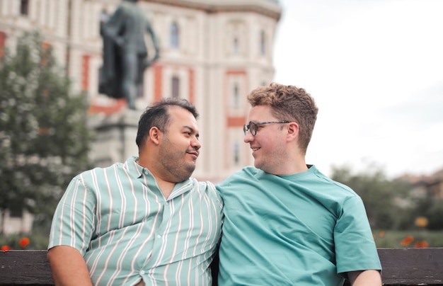 portrait of two men in a park