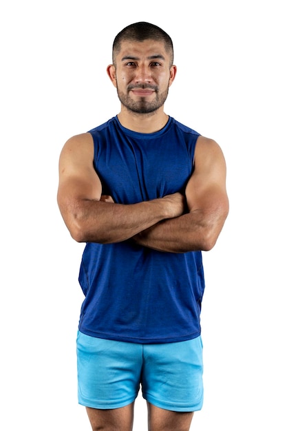 Portrait with a white background of a Latin man with sportswear looking at the camera