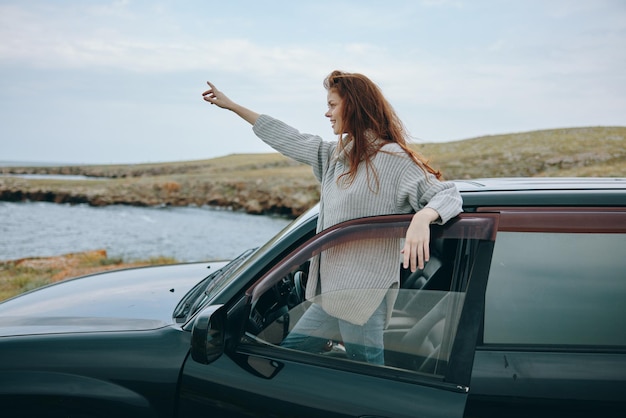 Portrait of a woman Adventure car trip nature travel female relaxing