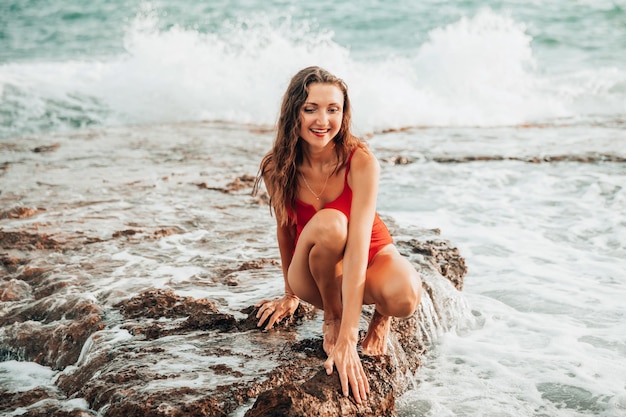 Portrait of a woman on the beach ocean unity with nature healthy lifestyle