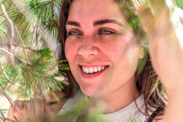 Portrait of a woman among the branches