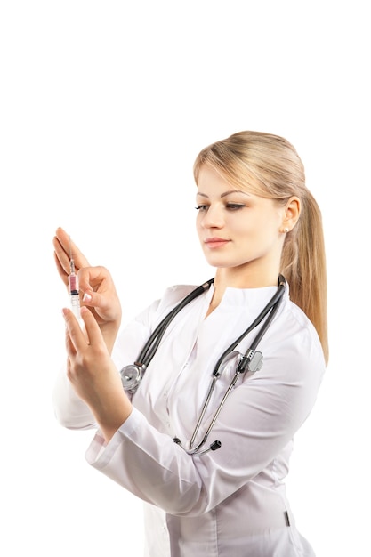 Portrait of woman doctor with a syringe on white background