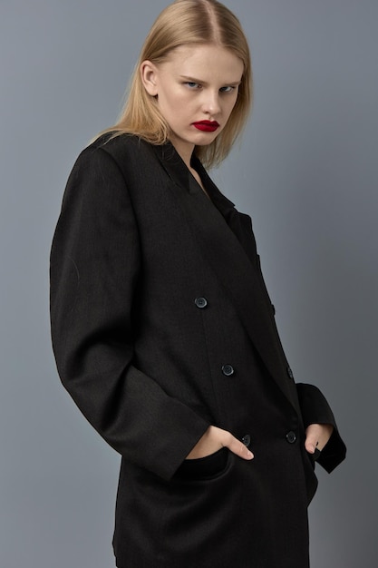 Portrait of a woman fashion makeup in black jacket studio model unaltered