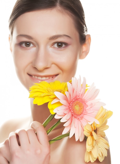 Portrait of a woman holding flowers