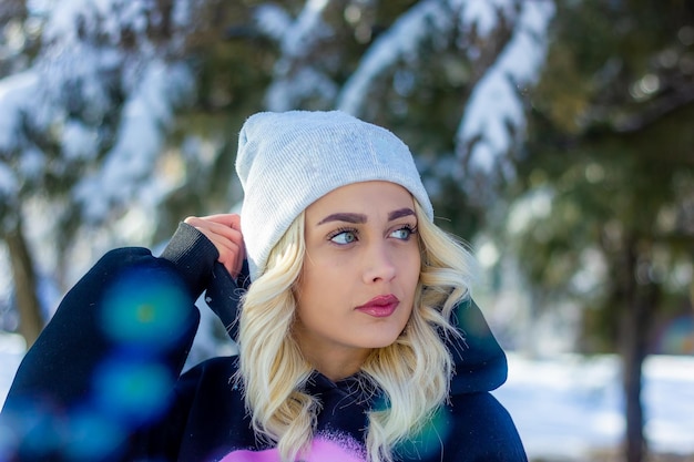 portrait of a woman in a park portrait of a woman in winter park portrait of a blonde woman woman