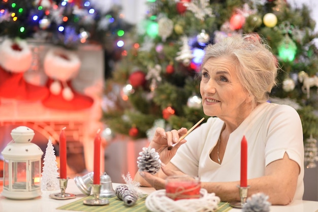 Portrait of a woman preparing for Christmas