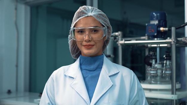 Portrait of a woman scientist in uniform working in curative laboratory