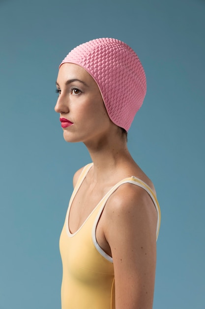 Portrait of woman in swimsuit at the studio